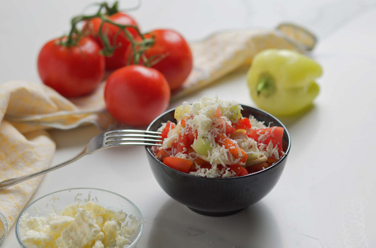 Salad and salad ingredients on a white background. 