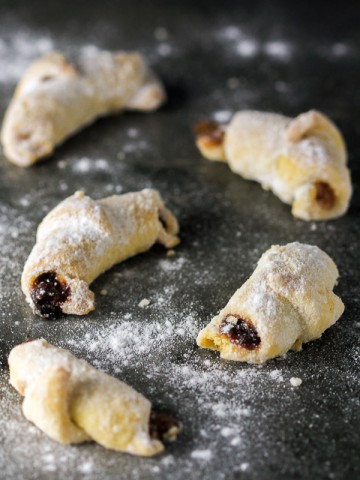 Perfect three ingredient crescents (margarine, eggs, and flour) filled with jam and baked. Classic combo for the win!